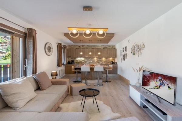 The photo shows the Les 4 Elements - Apt A11 - BO Immobilier - Châtel located in the city of Châtel.