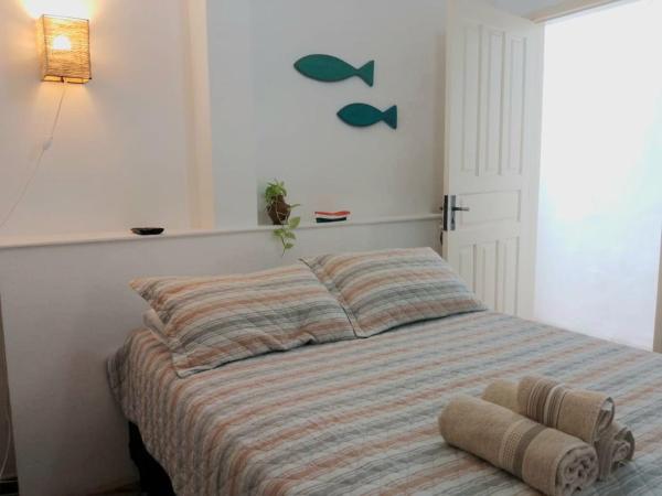 A la foto es mostra l'objecte Suítes Recanto cama e café situat a la ciutat de Arraial do Cabo.
