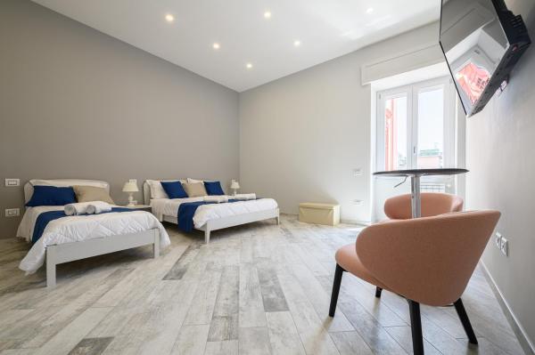 A la foto es mostra l'objecte [LUNGOMARE 6min] Suite Deluxe Miraglia with Parking situat a la ciutat de Nàpols.