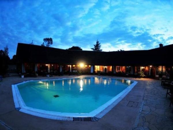 The photo shows the Naro Moru River Lodge located in the city of Naro Moru.