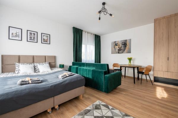Na zdjęciu widoczny jest obiekt Apartamenty RIO Skarbimierz-Osiedle położony w mieście Sulisław.