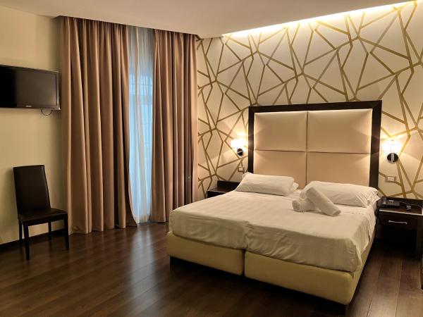 Na fotografii je vidět objekt Catone District Hotel nacházející se ve městě Řím.
