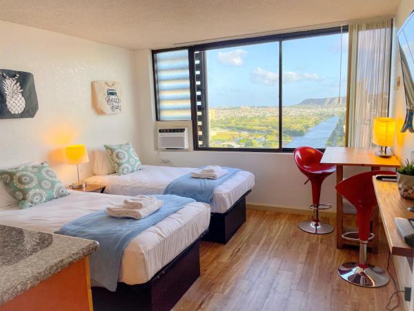 A la foto es mostra l'objecte Cozy Hawaiian Monarch Studio situat a la ciutat de Honolulu.
