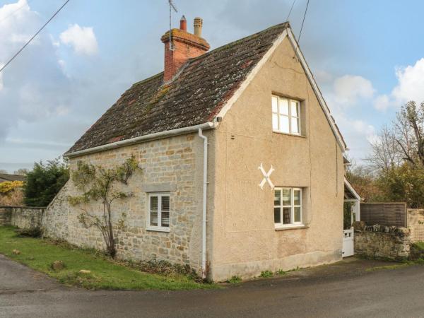 Op de foto is het object Palmers Green Cottage te zien, gelegen in de stad West Hatch.