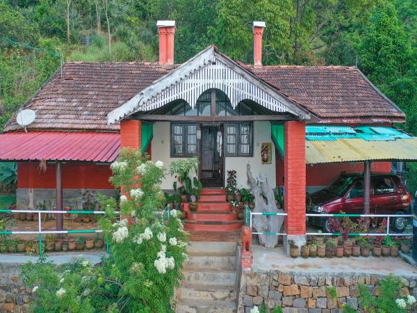 La photo montre l'objet DEVASHOLA HOMESTAY situé dans la ville de Coonoor.
