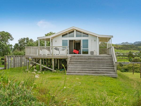 A la foto es mostra l'objecte Ocean Beach Beauty - Tairua Holiday Home situat a la ciutat de Tairua.