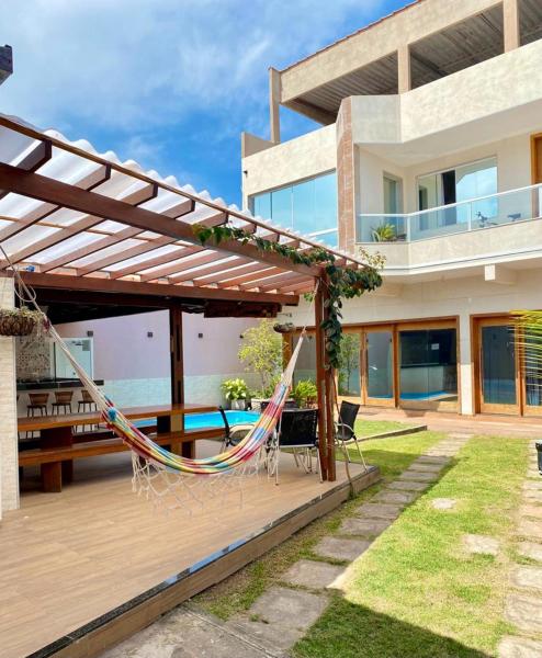 A la foto es mostra l'objecte Casa temporada com piscina situat a la ciutat de Jucu.