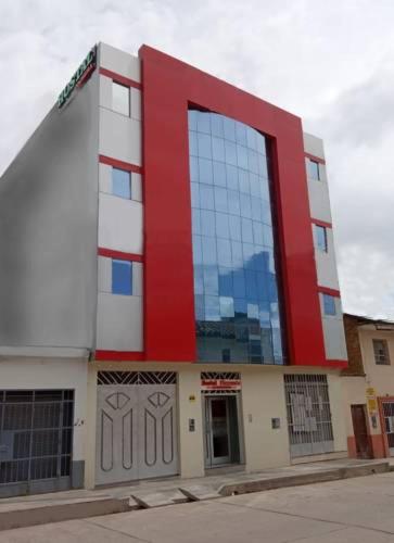 The photo shows the Hotel ARKONA located in the city of El Tambo.