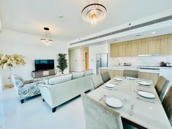 Na fotografii je vidět objekt Dar Vacation - Magnificent Palm View White 3BDR Apartment nacházející se ve městě Dubaj.