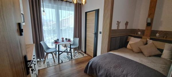 Na foto é possível ver o objeto Mini Apartament Rynek localizado na cidade de Wola Stróska.