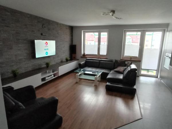 写真にはCekanowo市にあるApartament 24 dwie sypialnieが写っています。