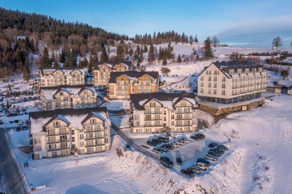 På billedet ses objektet Apartamenty Czarna Góra S8 beliggende i byen Sienna.