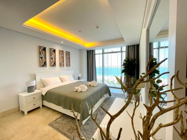 Na fotografii je vidět objekt Dar Vacation - Stunning Palm View 3BDR Apartment nacházející se ve městě Dubaj.