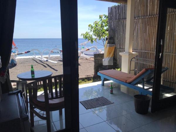 A la foto es mostra l'objecte Tambun Sari Beach Homestay situat a la ciutat de Amed.