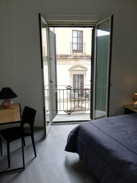 Na fotografii je vidět objekt Cala Apartment Centre nacházející se ve městě Palermo.