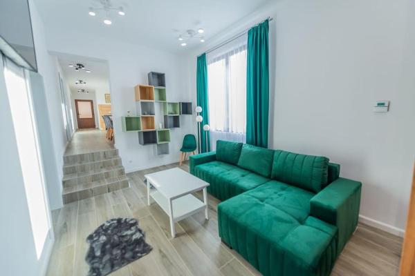 Na fotografii je vidět objekt CasiAna Apartment nacházející se ve městě Râşnov.
