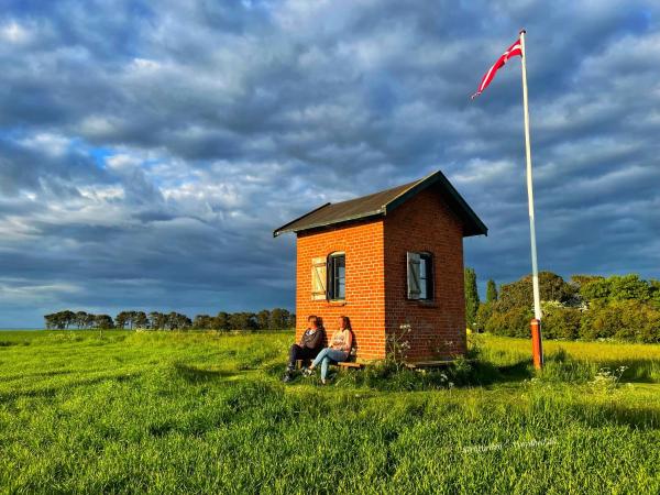Op de foto is het object Sovgodt Nyord - Primitiv overnatning te zien, gelegen in de stad Nyord.