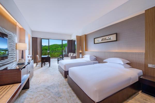 Na zdjęciu widoczny jest obiekt Mission Hills Hotel Resorts Dongguan położony w mieście Libeiling.