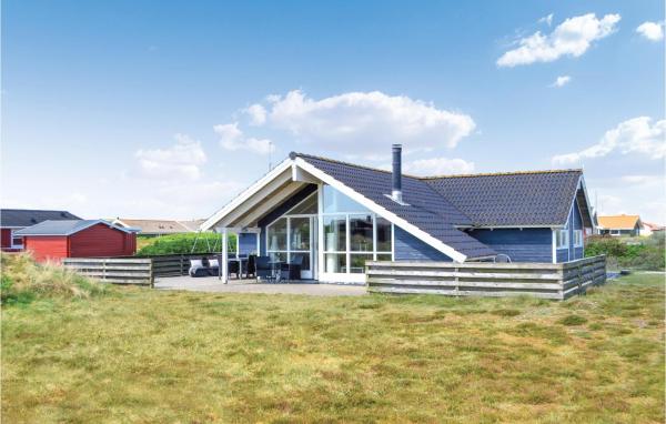A la foto es mostra l'objecte Holiday Home P Chr Dahls Vej Hvide Sande X situat a la ciutat de Bjerregård.