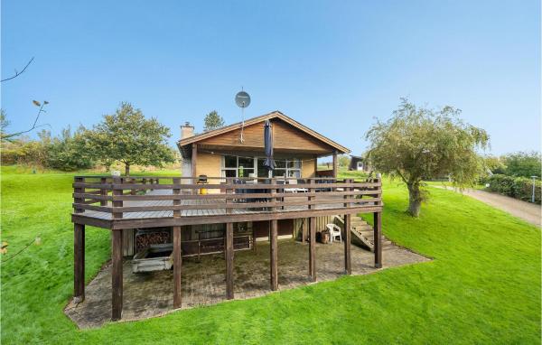 На фото показан объект Holiday Home Eskovvej, расположенный в городе Flovtrup.