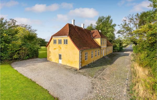 The photo shows the 6 Bedroom Gorgeous Home In Kværndrup located in the city of Kværndrup.