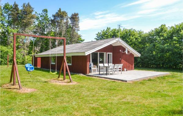Na fotografii je vidět objekt Holiday Home Nøddehaven Iii nacházející se ve městě Oksbøl.
