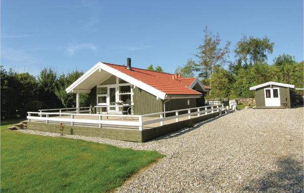 A la foto es mostra l'objecte Three-Bedroom Holiday Home In Humble situat a la ciutat de Humble.