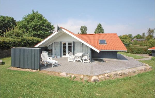 Na fotografii je vidět objekt Holiday Home Rønnebærvænget Hejls nacházející se ve městě Hejls.