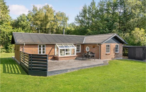 Na fotografii je vidět objekt Holiday Home Østmarken Toftlund V nacházející se ve městě Arrild.