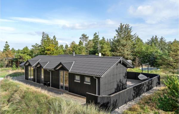 A la foto es mostra l'objecte Holiday Home Hvide Sande With A Fireplace 5 situat a la ciutat de Bjerregård.