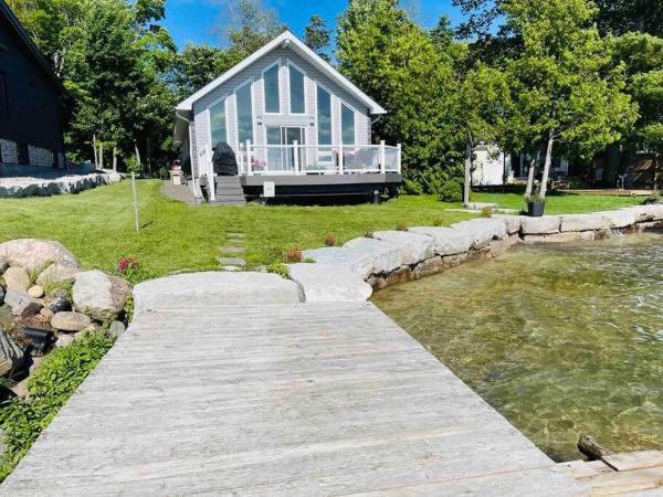 The photo shows the SouthLake Cottage on The Lake. located in the city of Sebright.