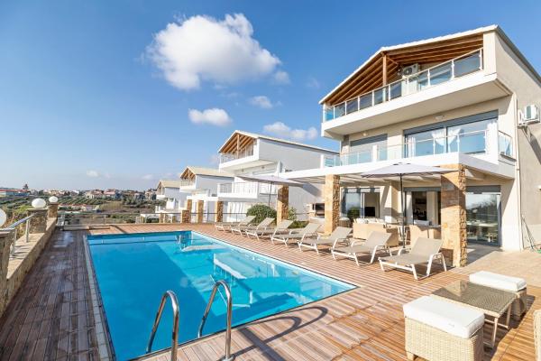 Foto 1: Nefeli & Dina Villas by Diomedes Group