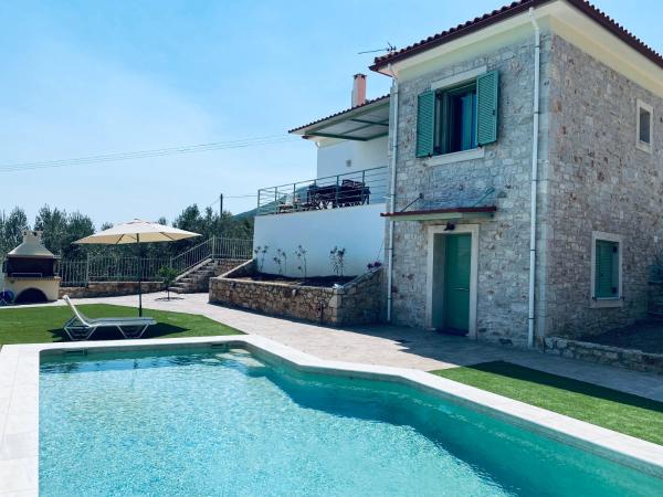 A la foto es mostra l'objecte Appartement Villa Pasithea situat a la ciutat de Rounaíika.