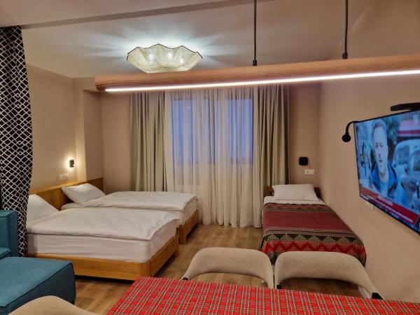 Na zdjęciu widoczny jest obiekt Roshka Apartment #304 położony w mieście Gudauri.