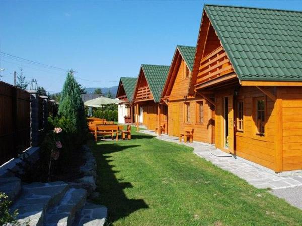 Na zdjęciu widoczny jest obiekt Domki nad jeziorem-Wodnik położony w mieście Zarzecze.