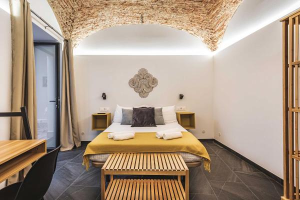 Na fotografii je vidět objekt Apartamentos Cáceres Central Suites nacházející se ve městě Cáceres.