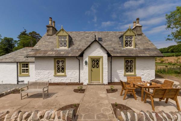 A la foto es mostra l'objecte Home Farm Cottage situat a la ciutat de Kirkcolm.