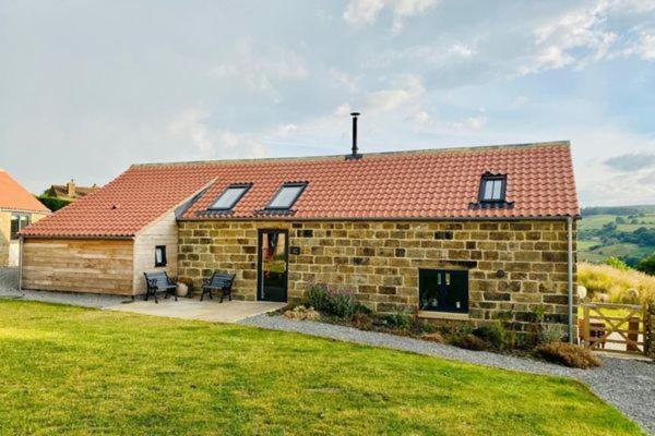 En la foto se muestra el objeto Green End Farm Cottages - The Cow Barn ubicado en la ciudad de Goathland.