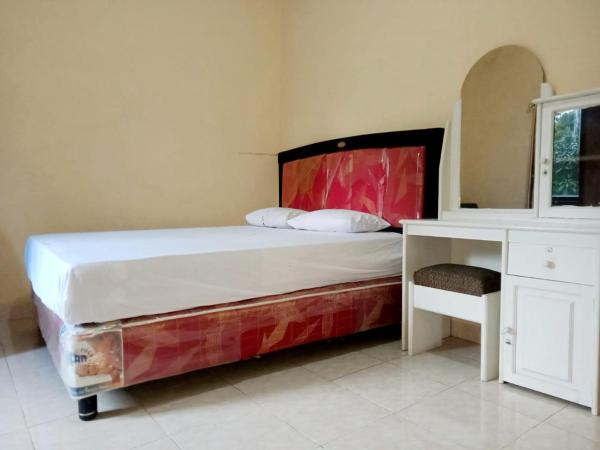 写真にはTasese市にあるHomestay Almanda Syariah Malinoが写っています。