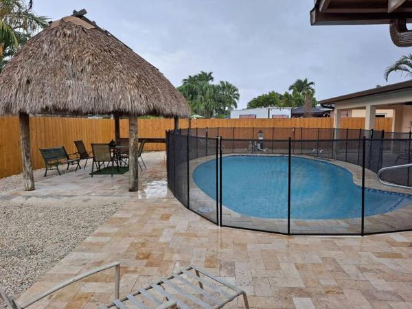 A la foto es mostra l'objecte Pool home in Miami situat a la ciutat de Tamiami.