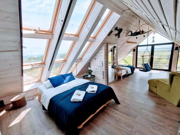 A la foto es mostra l'objecte House of Freedom with Sea view sauna and jacuzzi situat a la ciutat de Mrzezino.