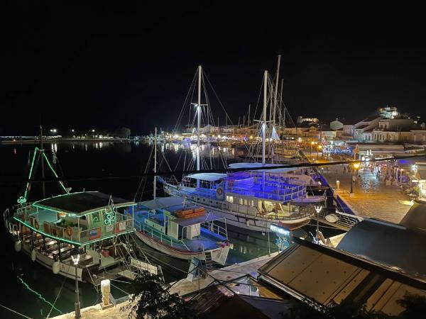 The photo shows the Aegean Blu Port House Pythagoreio located in the city of Pythagoreio.