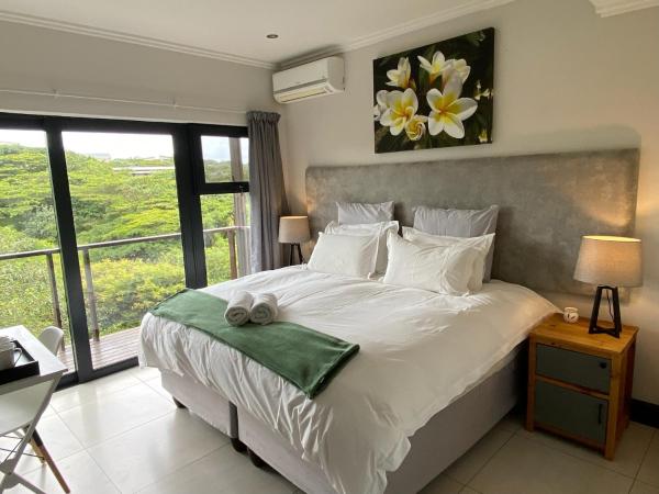 A la foto es mostra l'objecte Luxury Room with Private Balcony and Stunning Dam Views situat a la ciutat de Ballito.