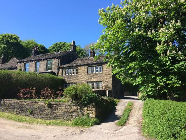 A la foto es mostra l'objecte Hawkyard's Cottage situat a la ciutat de Diggle.