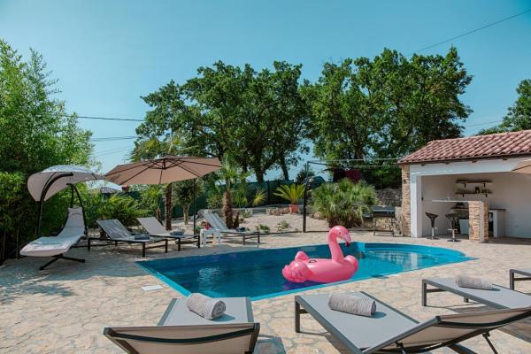 A la foto es mostra l'objecte Holiday House Jolly with Private Pool situat a la ciutat de Volosko.