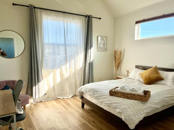 写真にはオースティン市にあるDesigner NEW 10min dt Pet friendly 7min Park-Room Aが写っています。