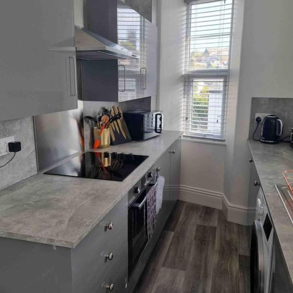 写真にはStratton市にあるFirst floor apartment in Stratton, Budeが写っています。