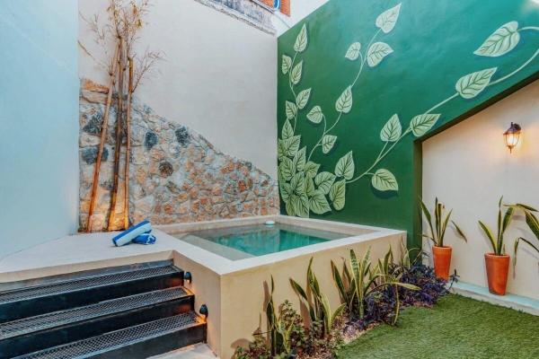 A la foto es mostra l'objecte Ya ax nah Luxury house in downtown Mérida situat a la ciutat de Mérida.