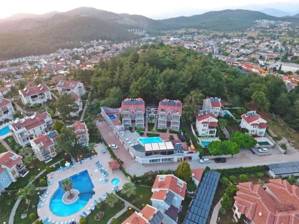 På billedet ses objektet Nokta Belcekız Suit Apart, Fethiye, Ölüdeniz beliggende i byen Fethiye.