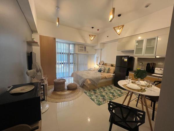 A la foto es mostra l'objecte Cozy Studio Viceroy Residences McKinley Hill Bgc situat a la ciutat de Manila.